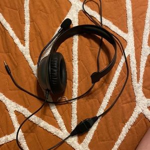 Brand new adjustable gaming headphones with microphone.